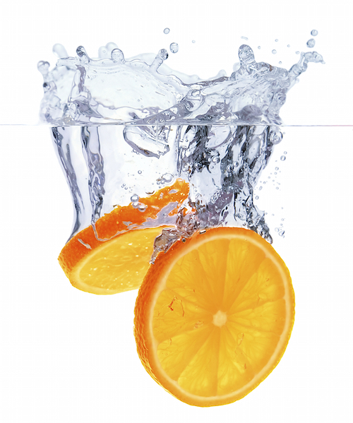 falling orange slices with water splashes